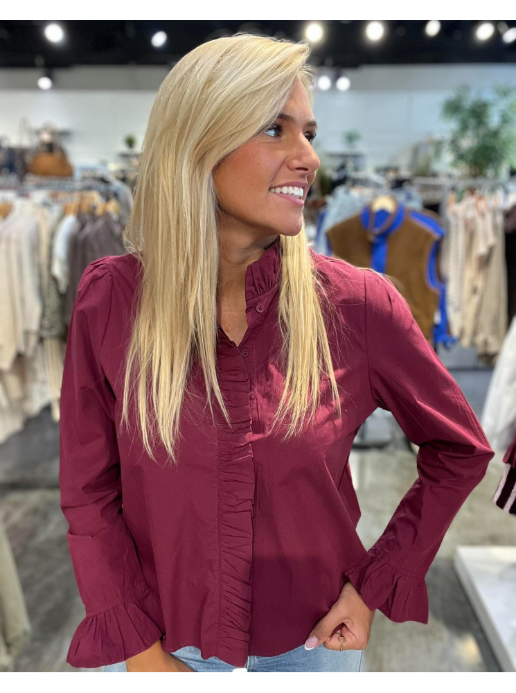 Chemise à froufrou manches longues